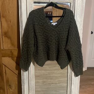 Green textured sweater